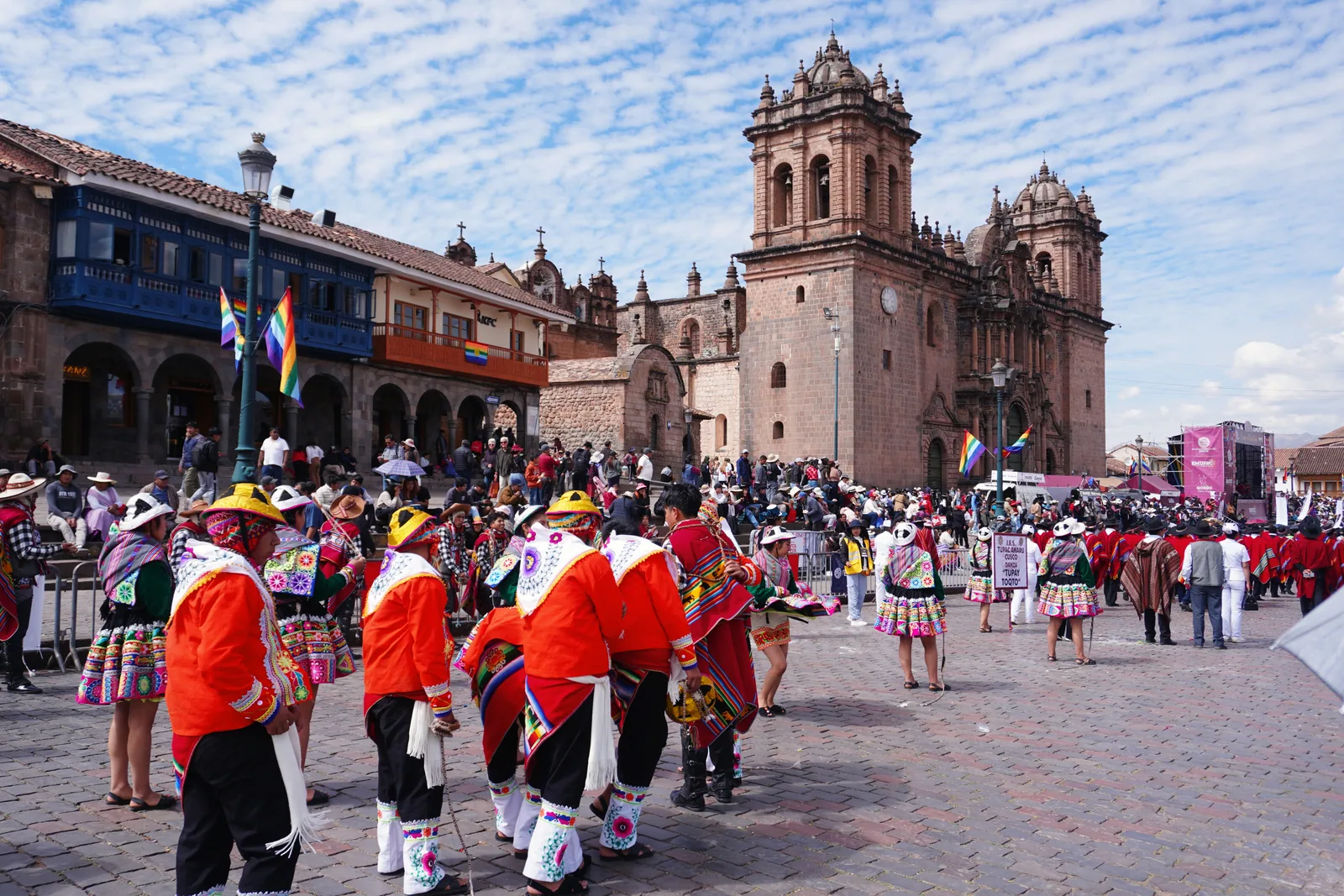 A procession passing the cathedral in Cusco’s main square