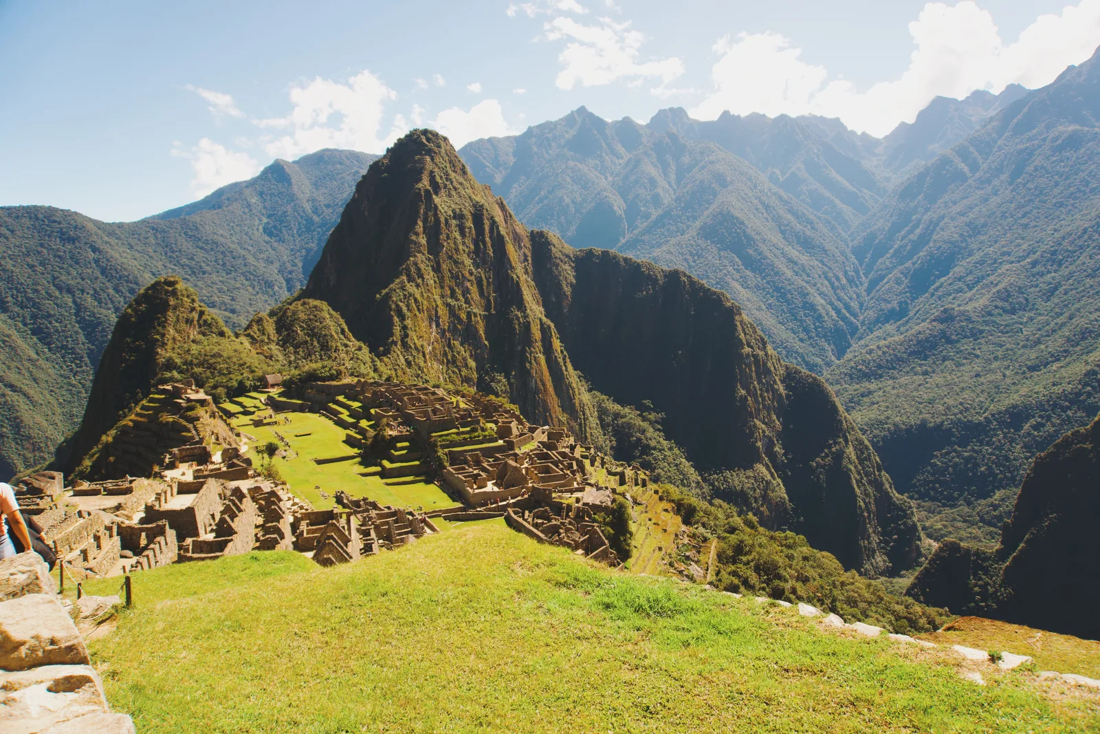 The stone terraces of Machu Picchu below the green Andean peaks