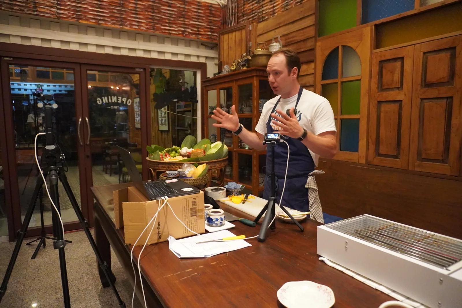 Jason teaching a cooking class from a restaurant in Thailand